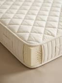 Latex Mattress — close-up of the quilted cover and natural latex core