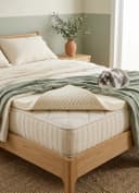 Latex Mattress Topper — the perforated latex layer on a bed with the Sleeping Bunny rabbit